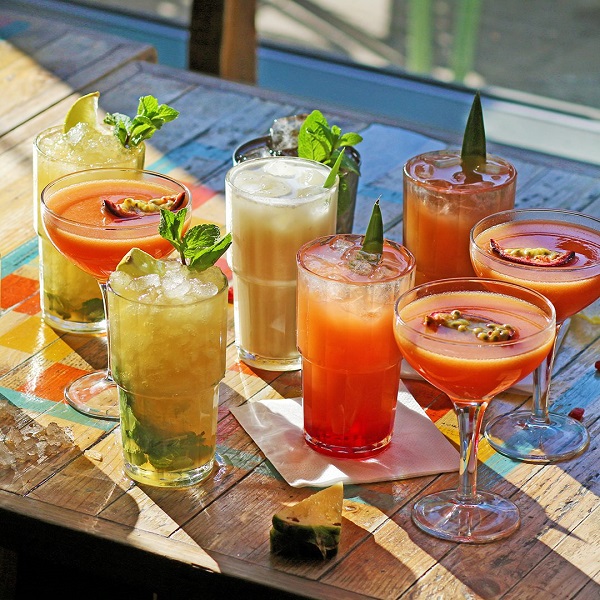 A table with colourful cocktails
