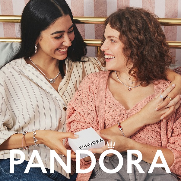 Two people exchanging jewellery boxes, text says Pandora