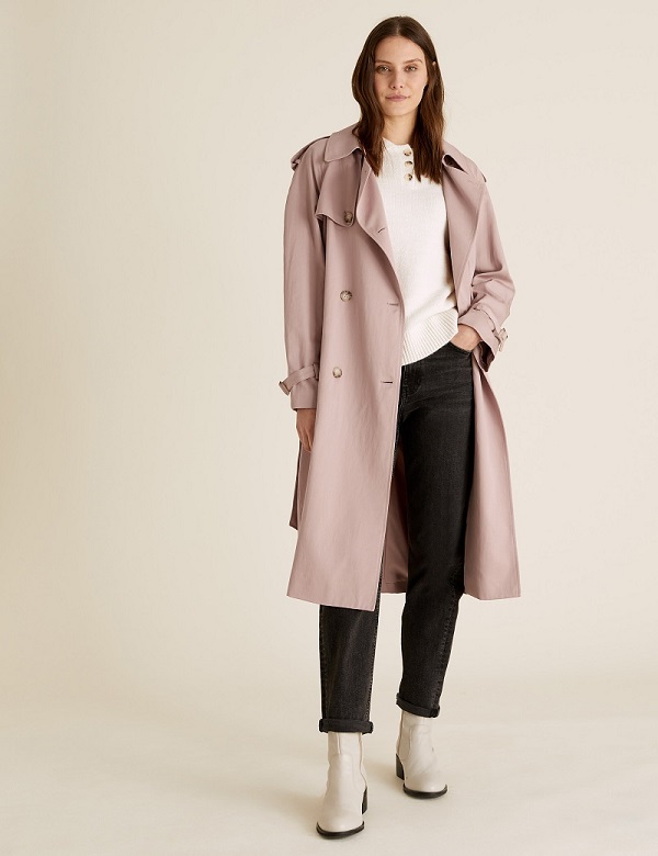 A woman weaing a long coat from M&S